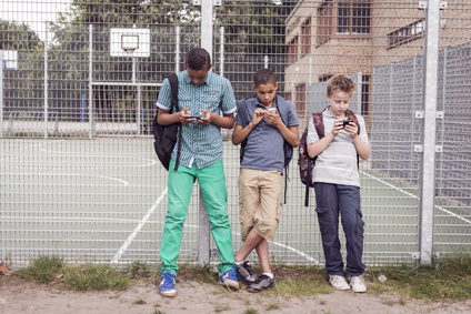 Teens browsing outdoors